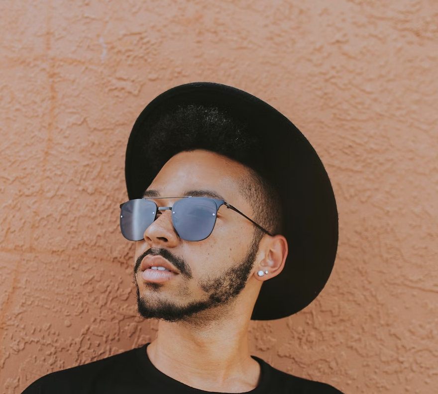 bearded guy in a black hat